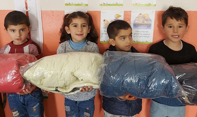 Ağrı'da İhtiyaç Sahibi Çocuklara Kışlık Bot ve Mont Dağıtıldı