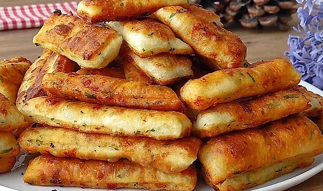Sofralarınıza neşe katacak: Kolay Peynirli Çubuk Pişi tarifi