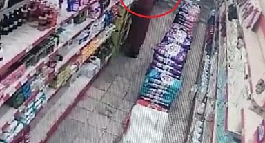 Temizlik malzemesi çalan kadın kameraya yansıdı