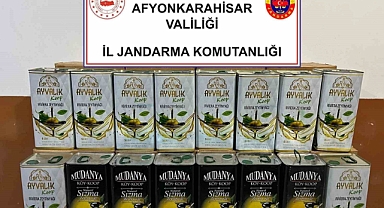 Ürettiği sahte zeytinyağlarını satamadan jandarmaya yakalandı