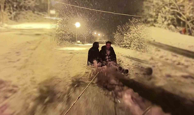 Erzurum Uzundere'de gençlerin kar keyfi