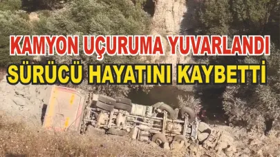 Kum yüklü kamyon uçuruma yuvarlandı: 1 ölü