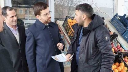 Müftü Geylani esnafla bir araya gelerek imsakiye hediye etti